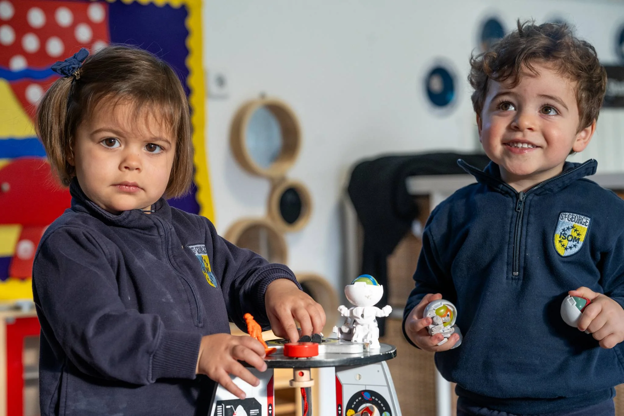 Two children on the tricycle