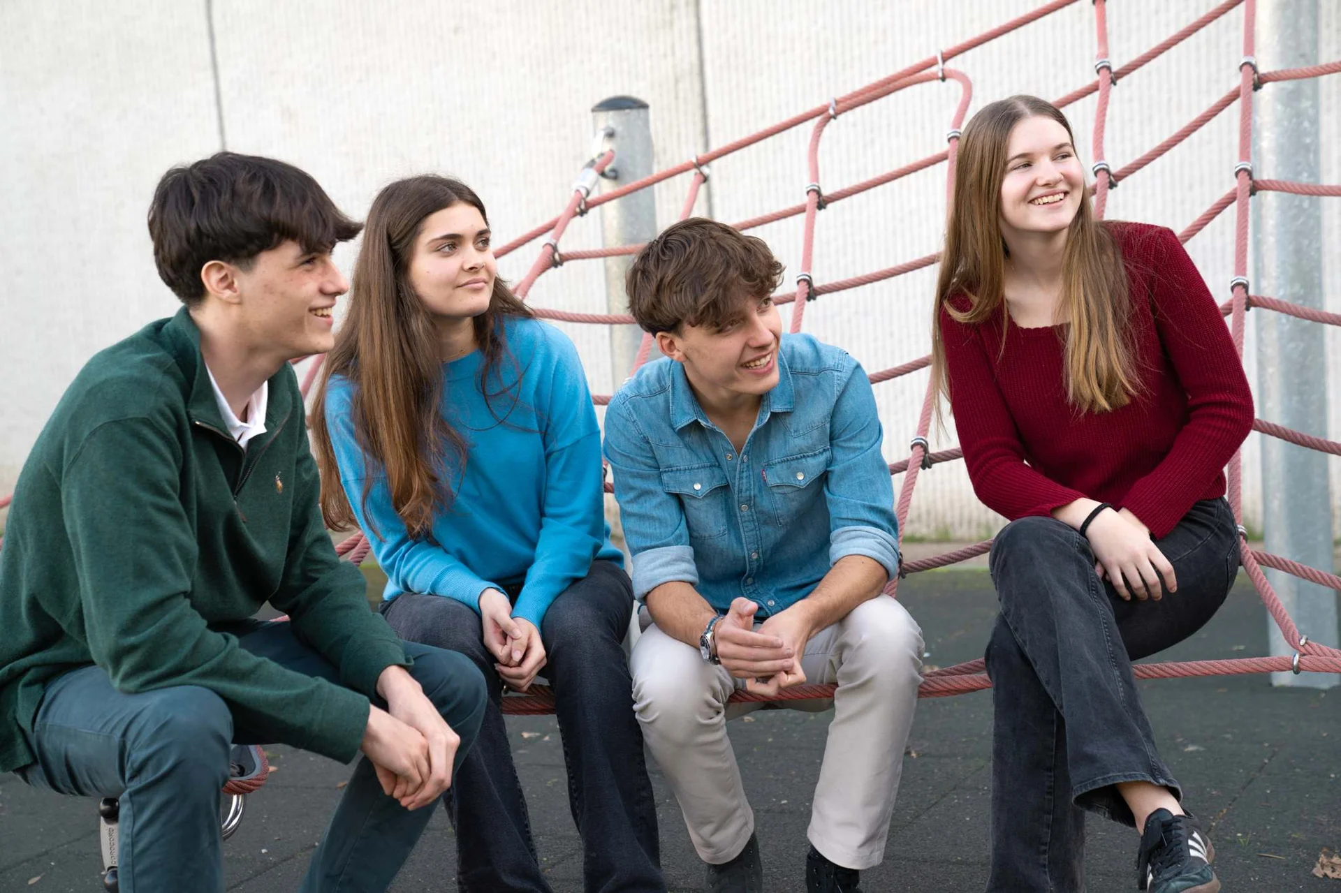 Four students smiling