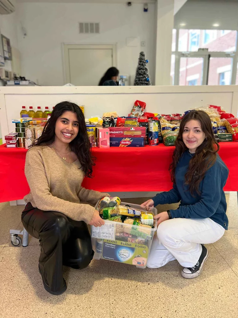 Two girls with food basket 