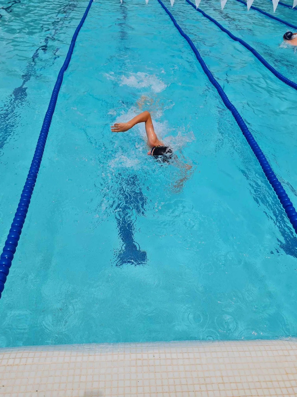 Student swimming in the pool 