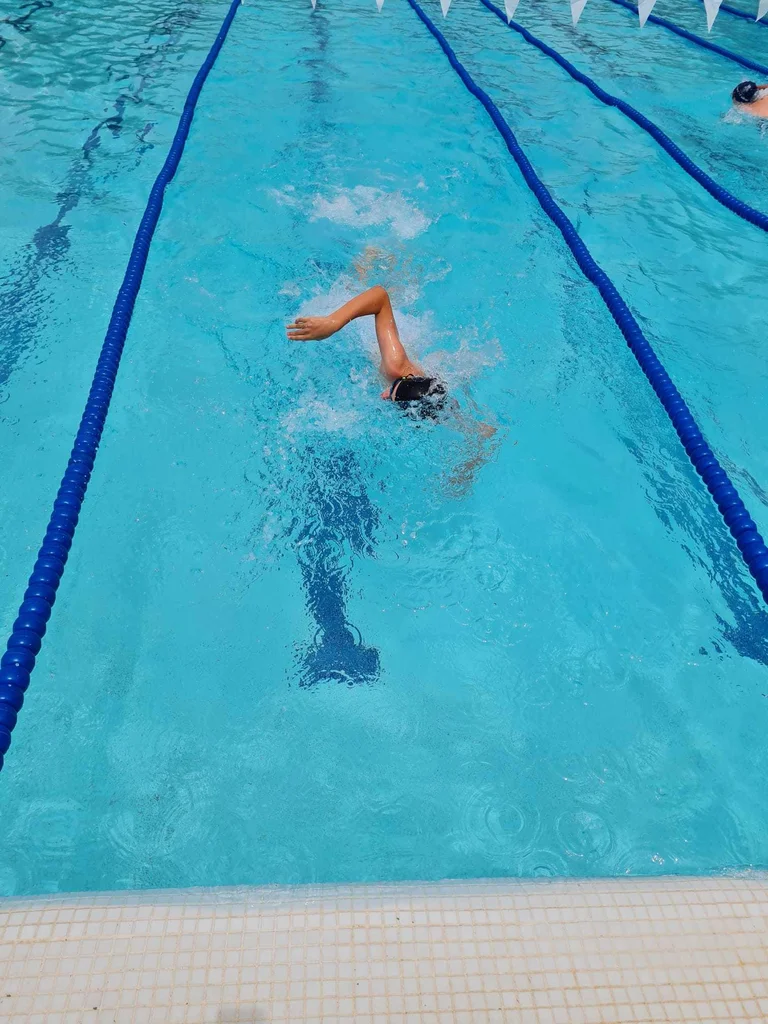 Student swimming in the pool 