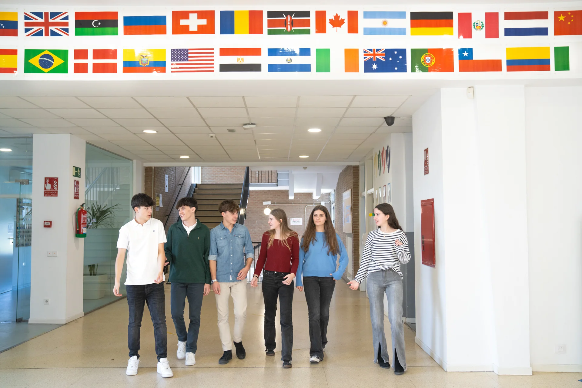 Students walking in the school hallway 