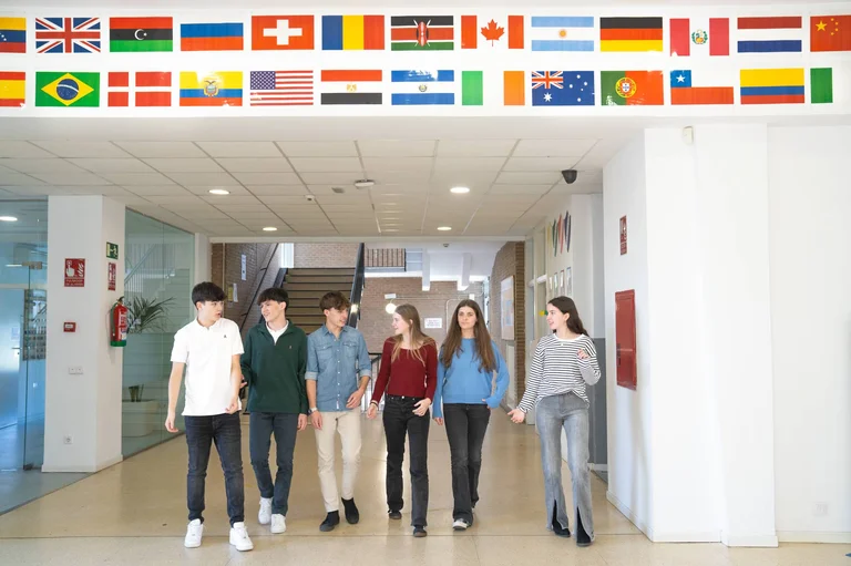Students walking in the school hallway