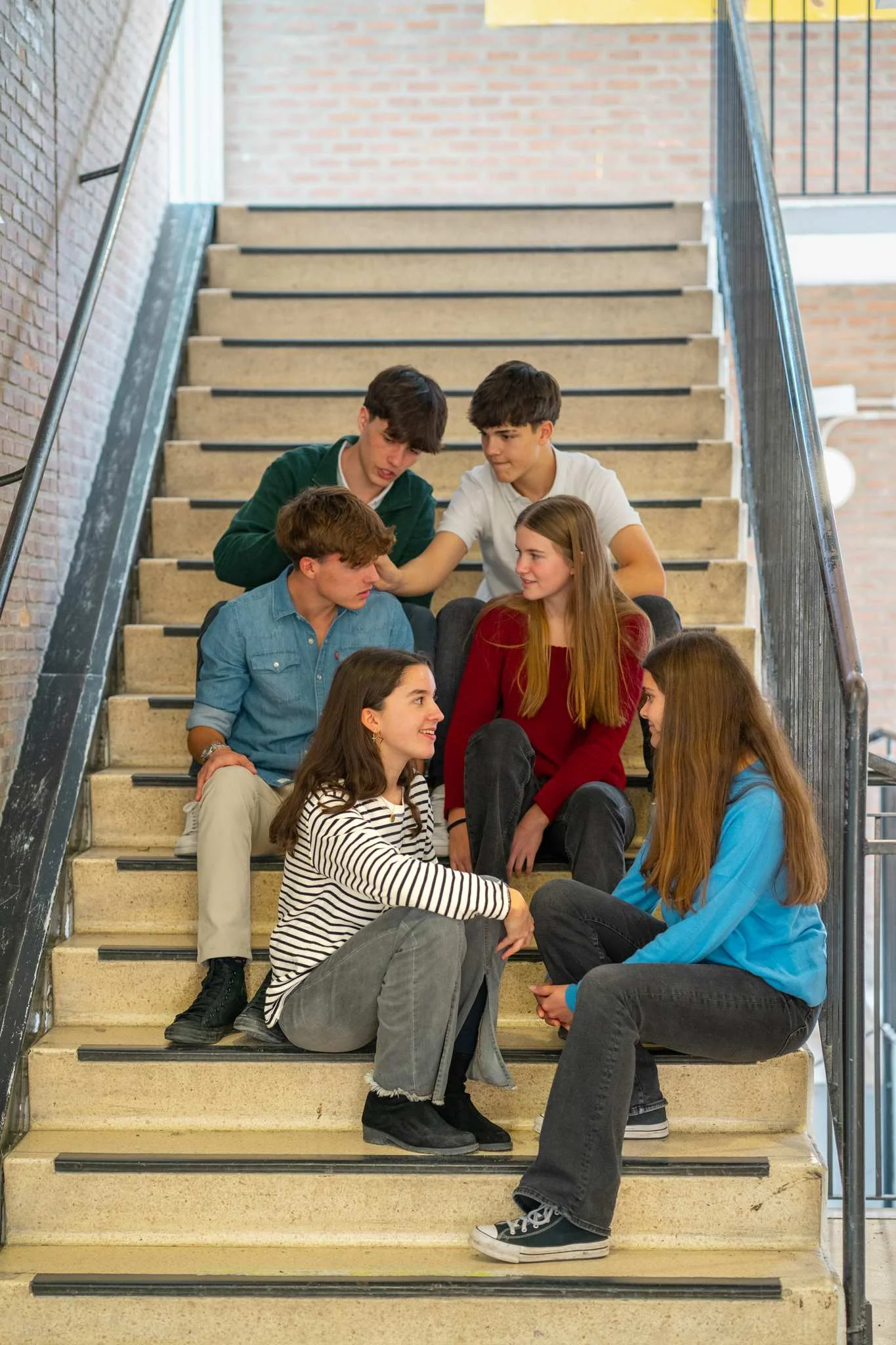 Students sitting on the stairs