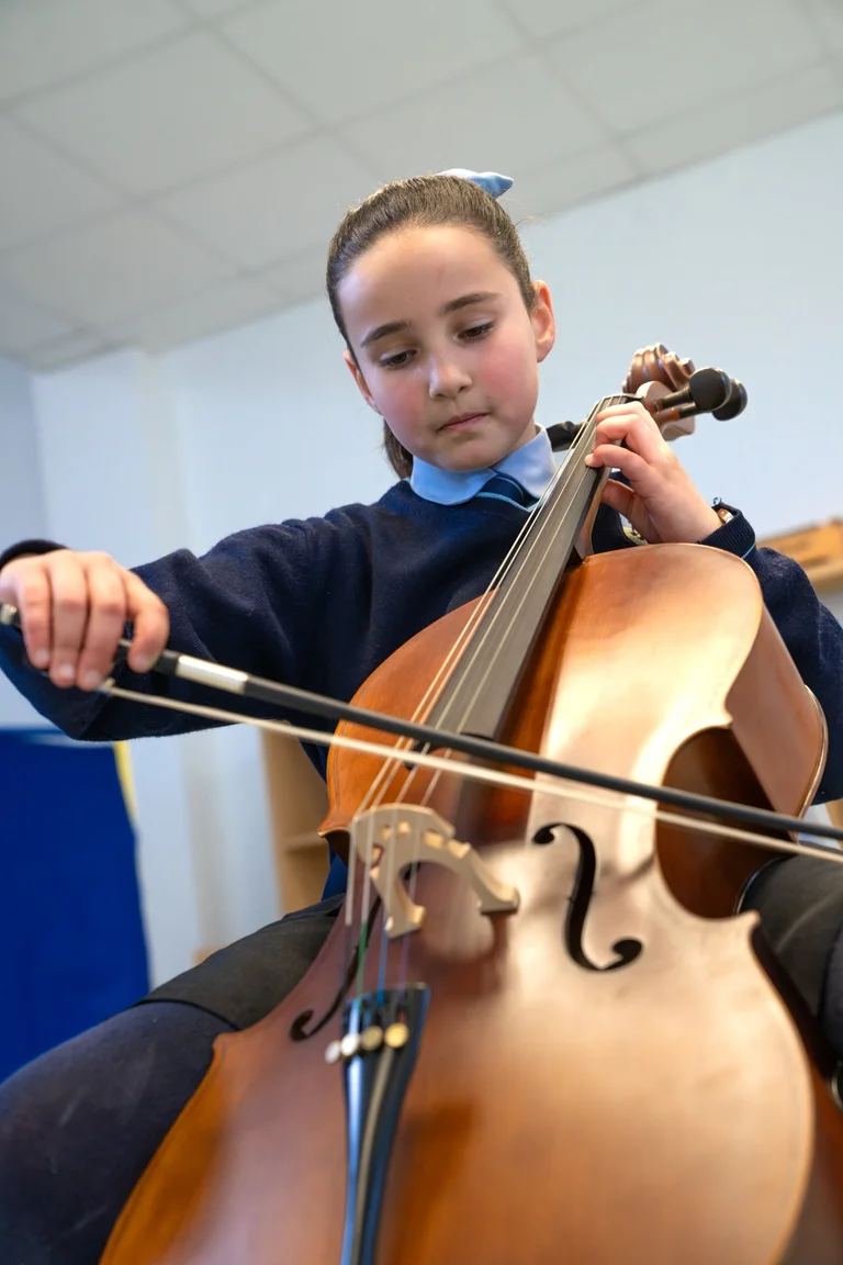 Student playing cello