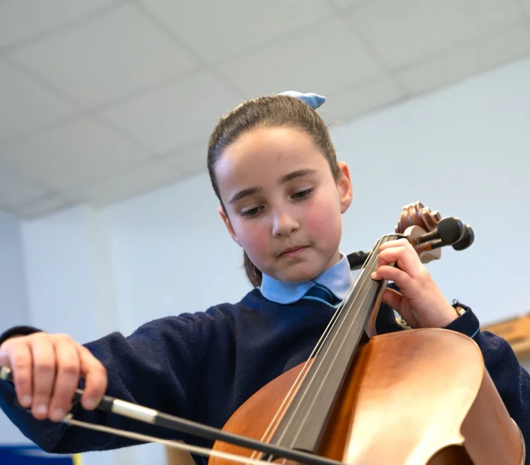 Student playing cello
