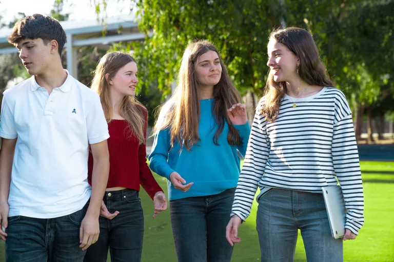 Students smiling each others
