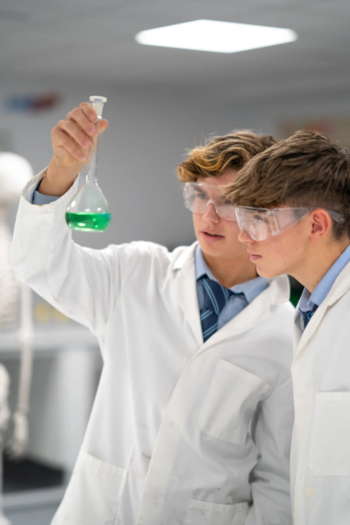 Two students during chemistry class