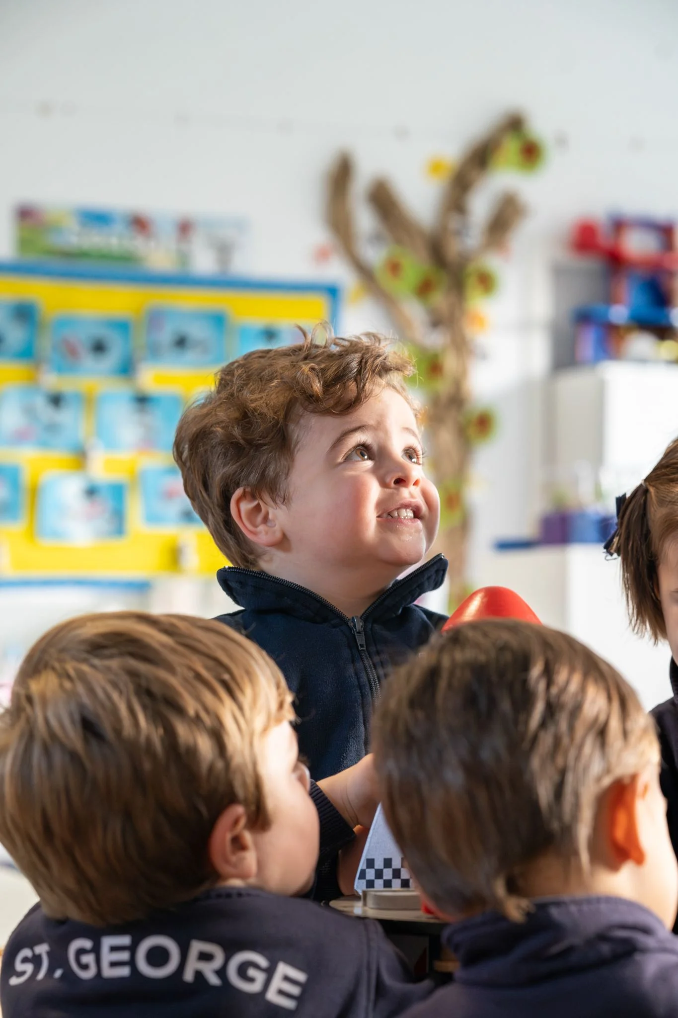 Child smiling in the classroom